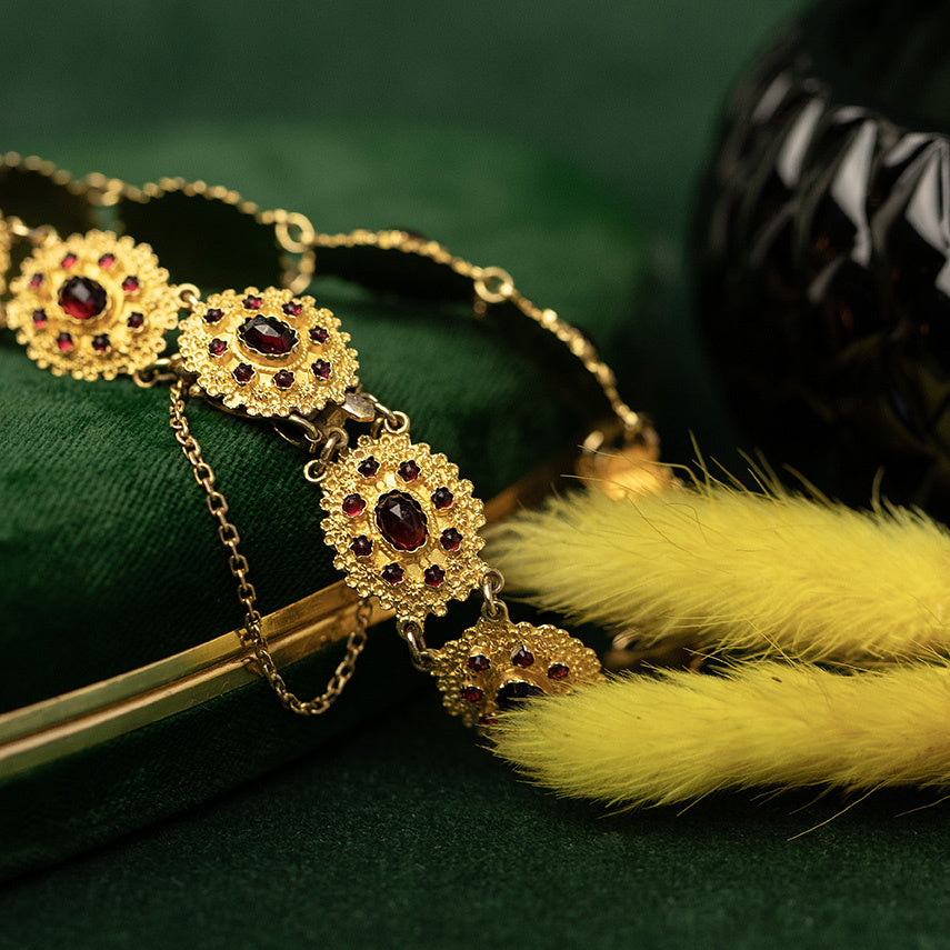 Gouden vintage armband met granaat 14 krt