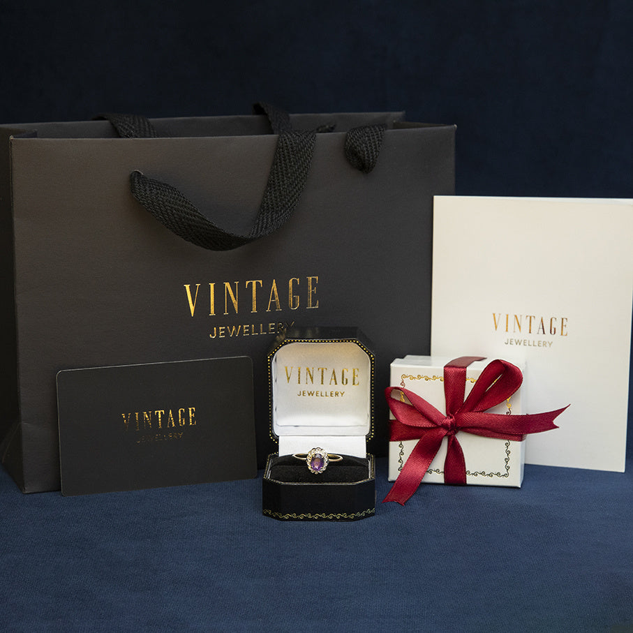 Gouden vintage entourage ring met saffier en zirkonia 14 kt