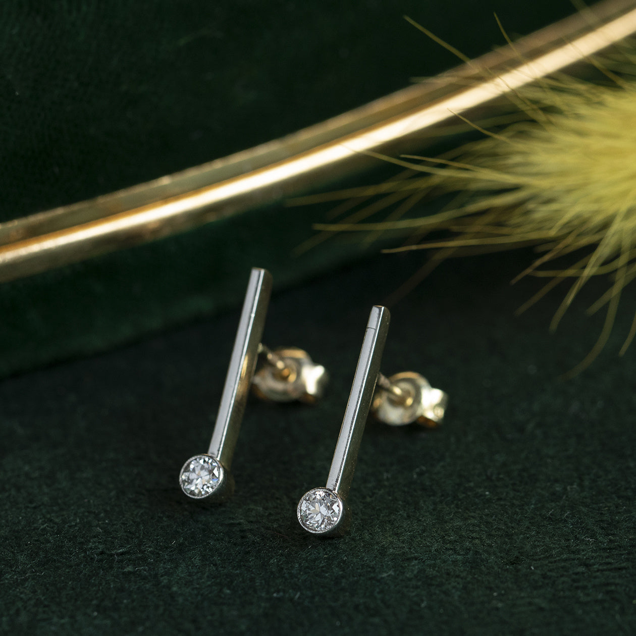 Gouden oorstekers met diamant 14 krt/900