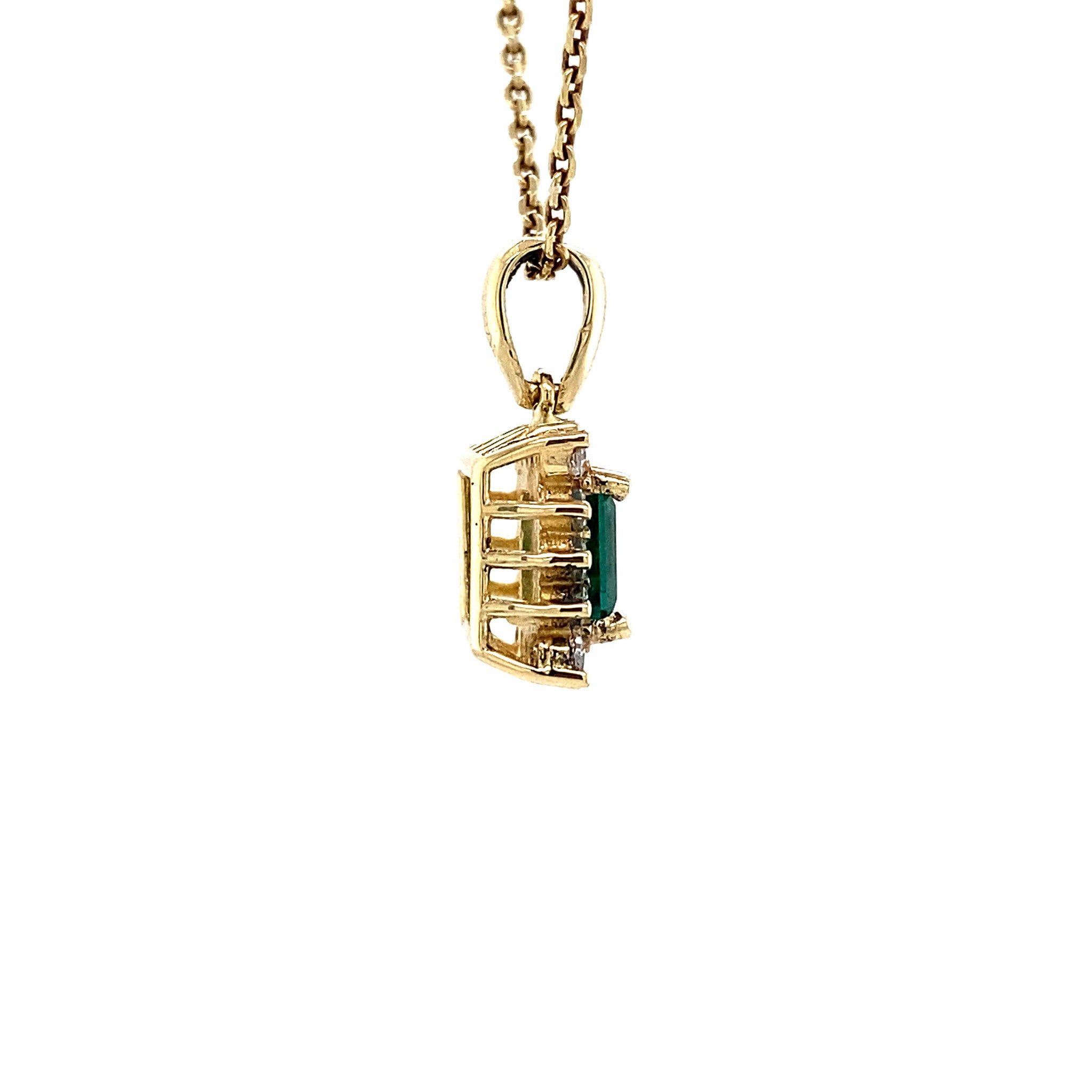 14 kt gold pendant with emerald and zirconia