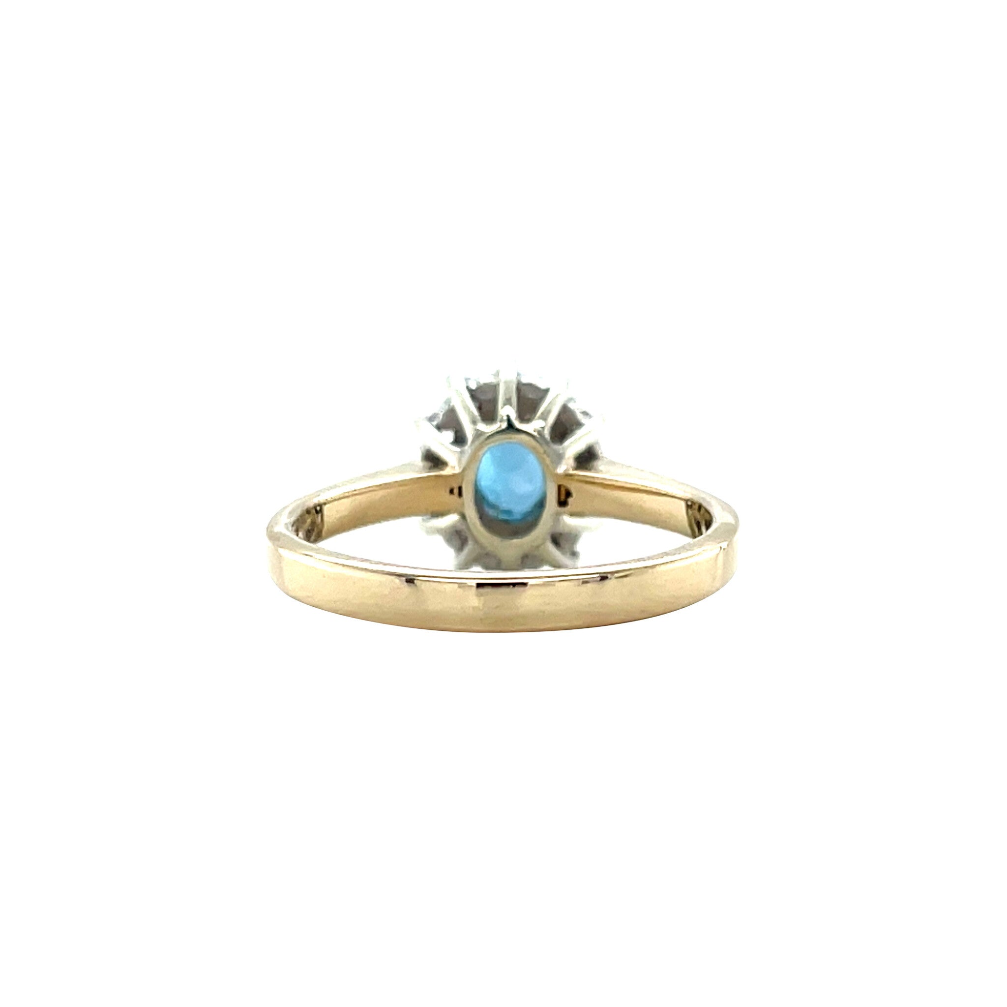 Vintage entourage ring met topaas en diamant 9 krt