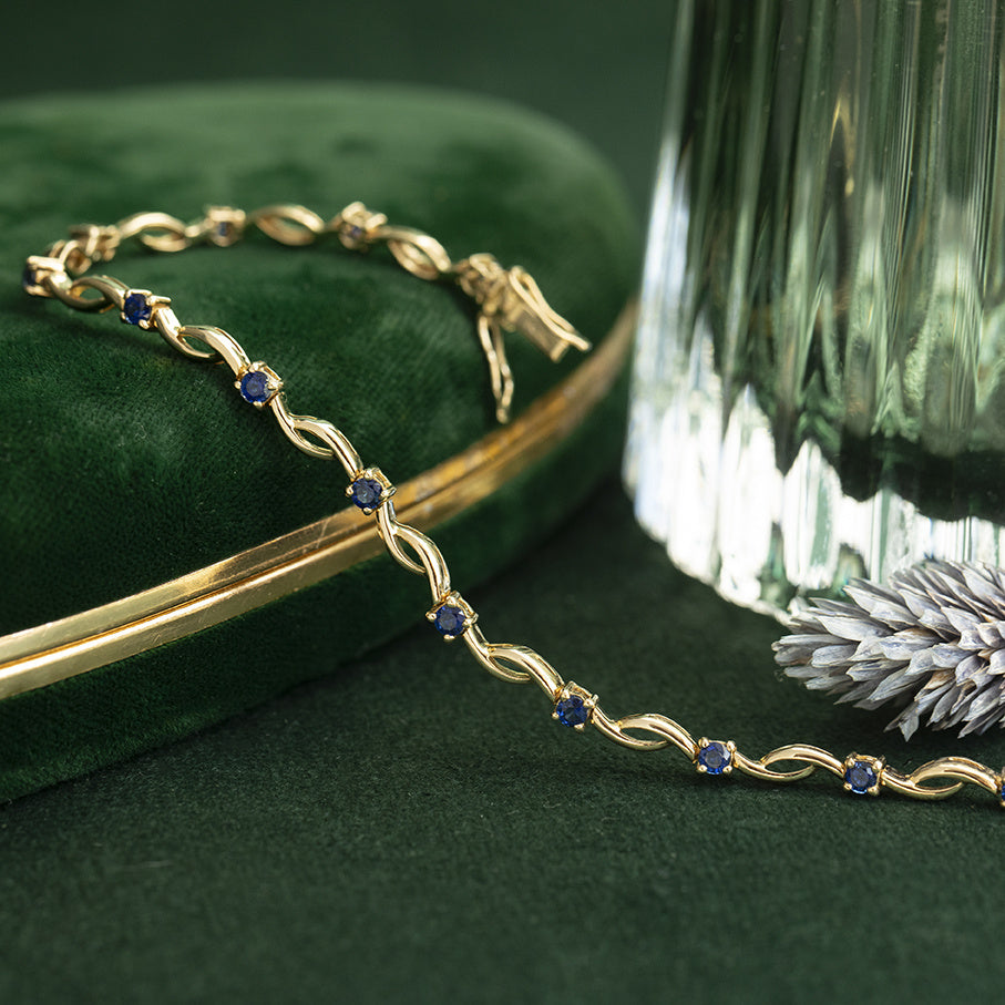 Gouden vintage armband met saffier 18 krt