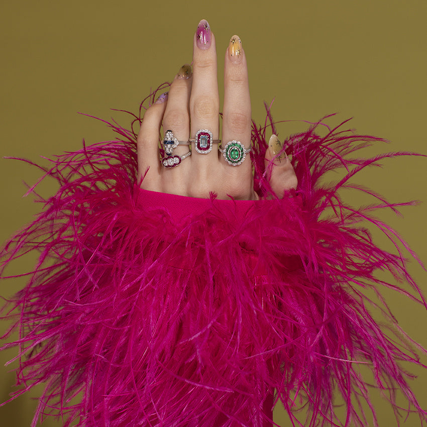 Gouden ring met smaragd en diamant 14 kt