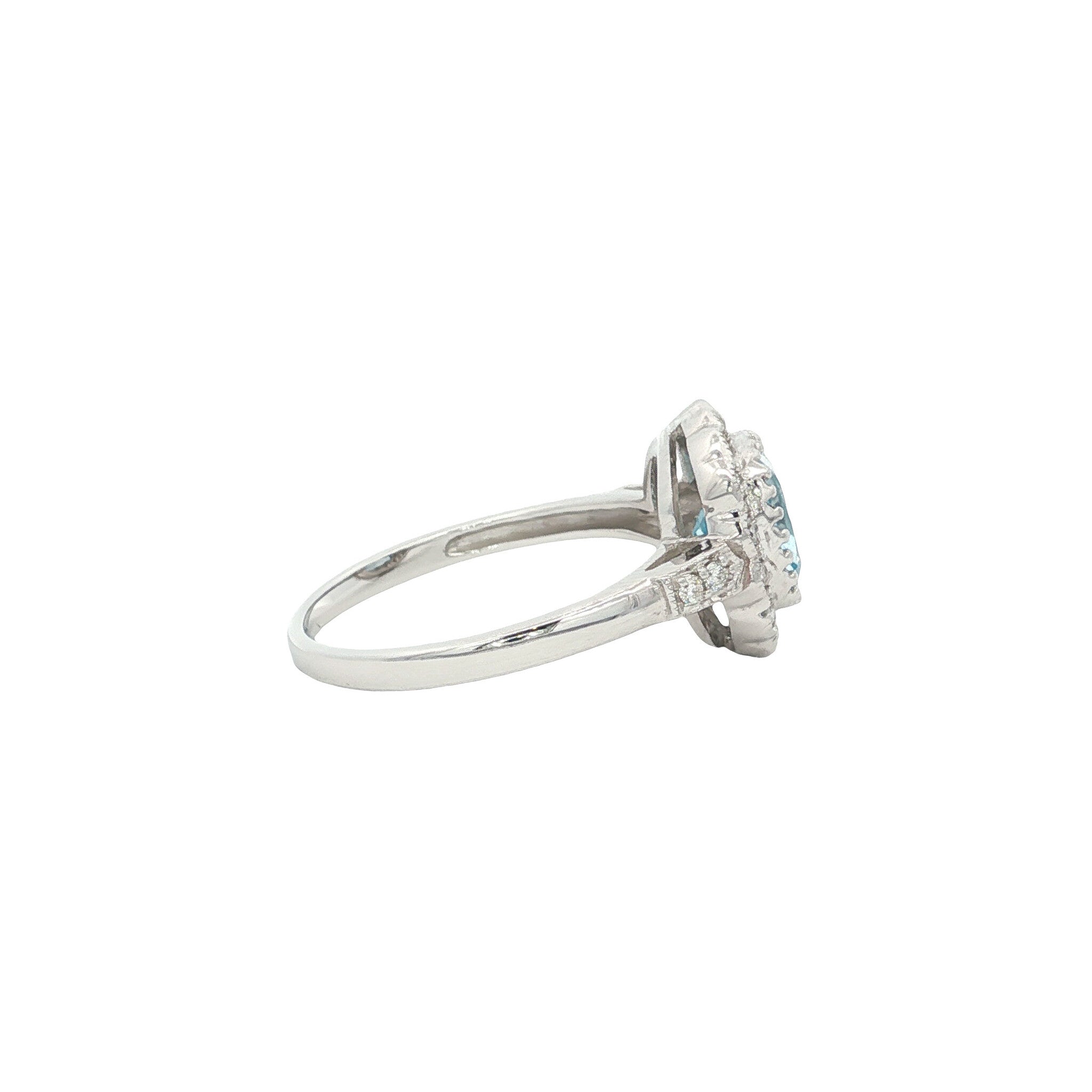 Gouden ring met blauwe topaas en diamant 14 kt
