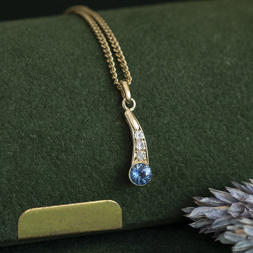Vintage pendant with topaz and diamond, 8 kt gold