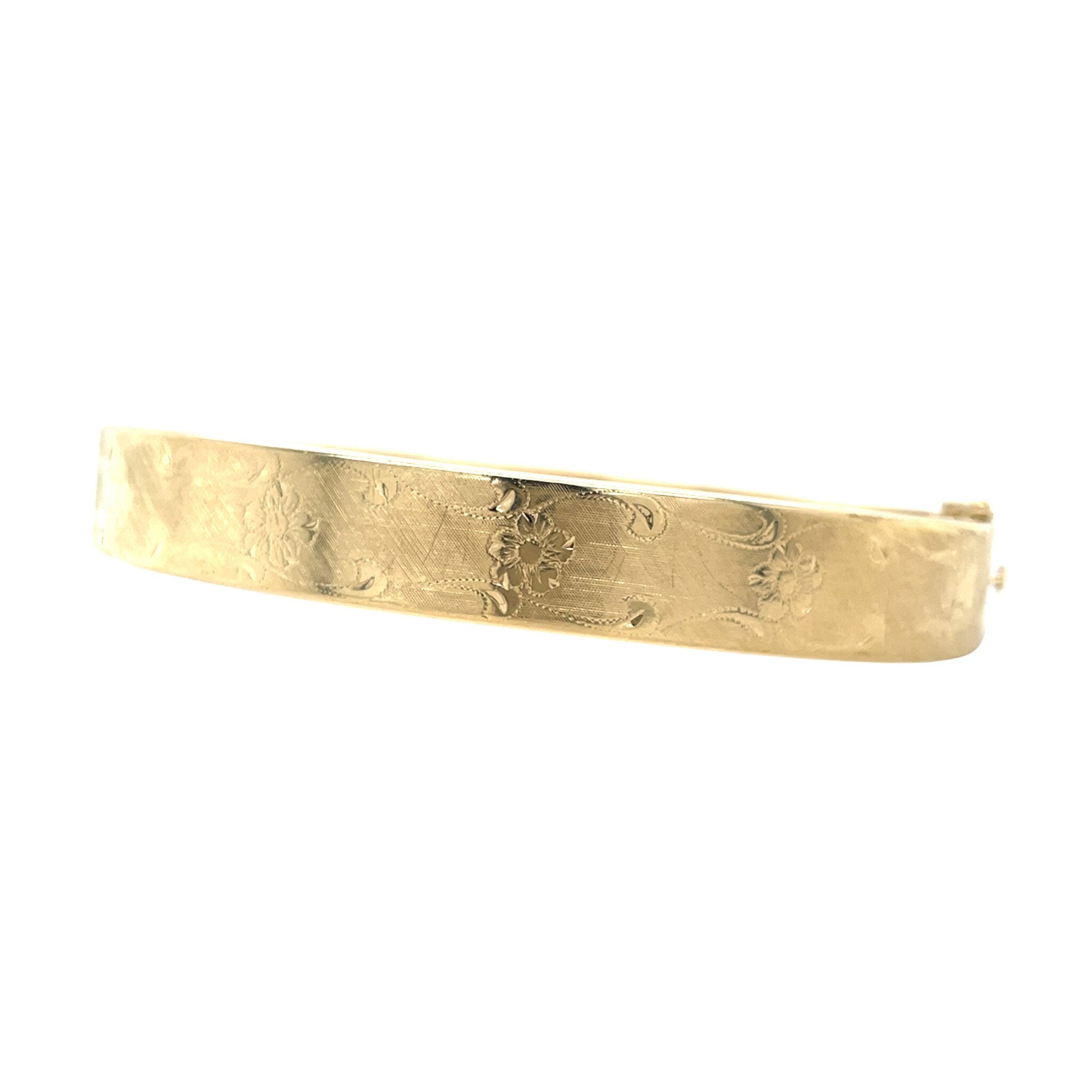 Gouden vintage bangle met gravure 14 krt