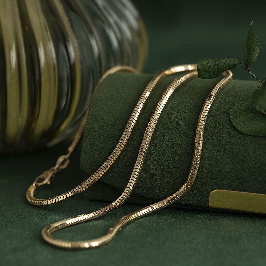 Gouden vintage slangen collier 14 kt