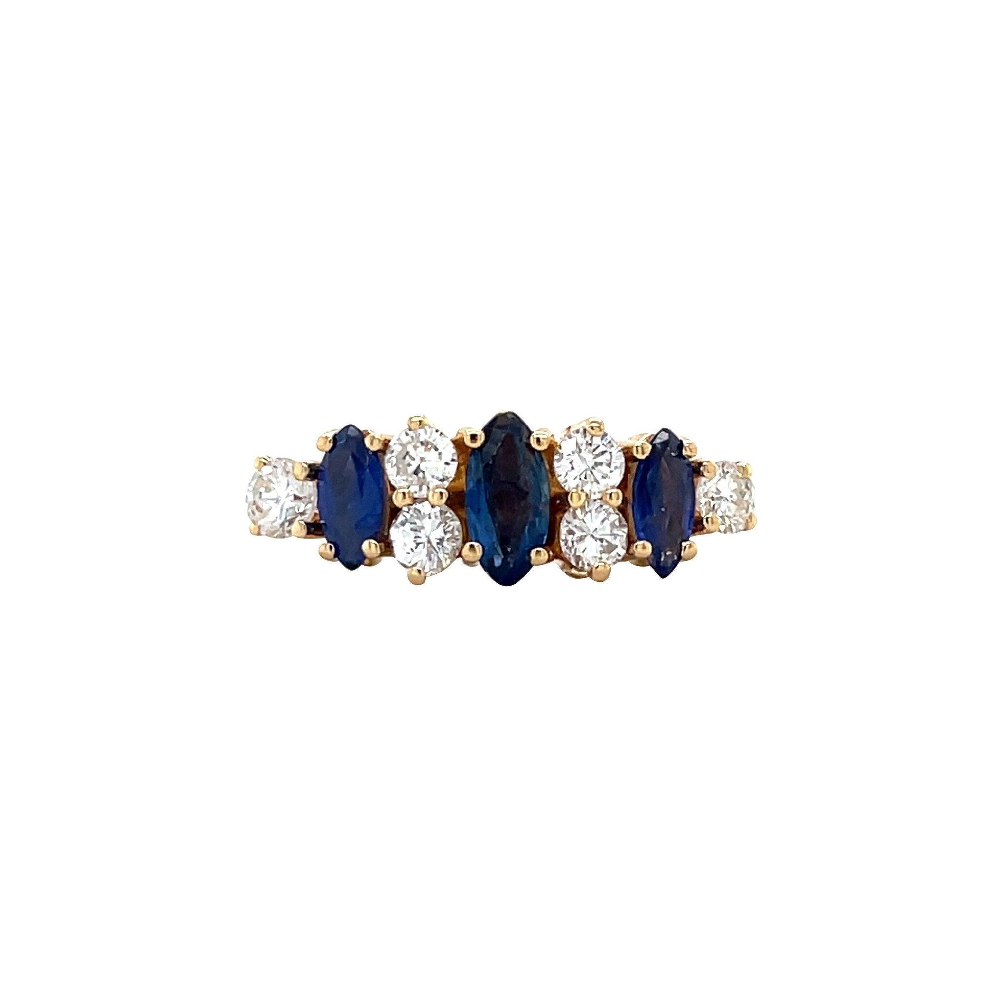 Gold row ring with sapphire and diamond 18 kt