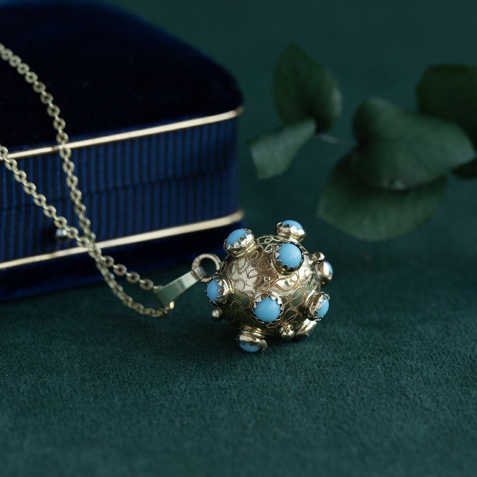 Gouden sputnik hanger met kleursteen 14 krt