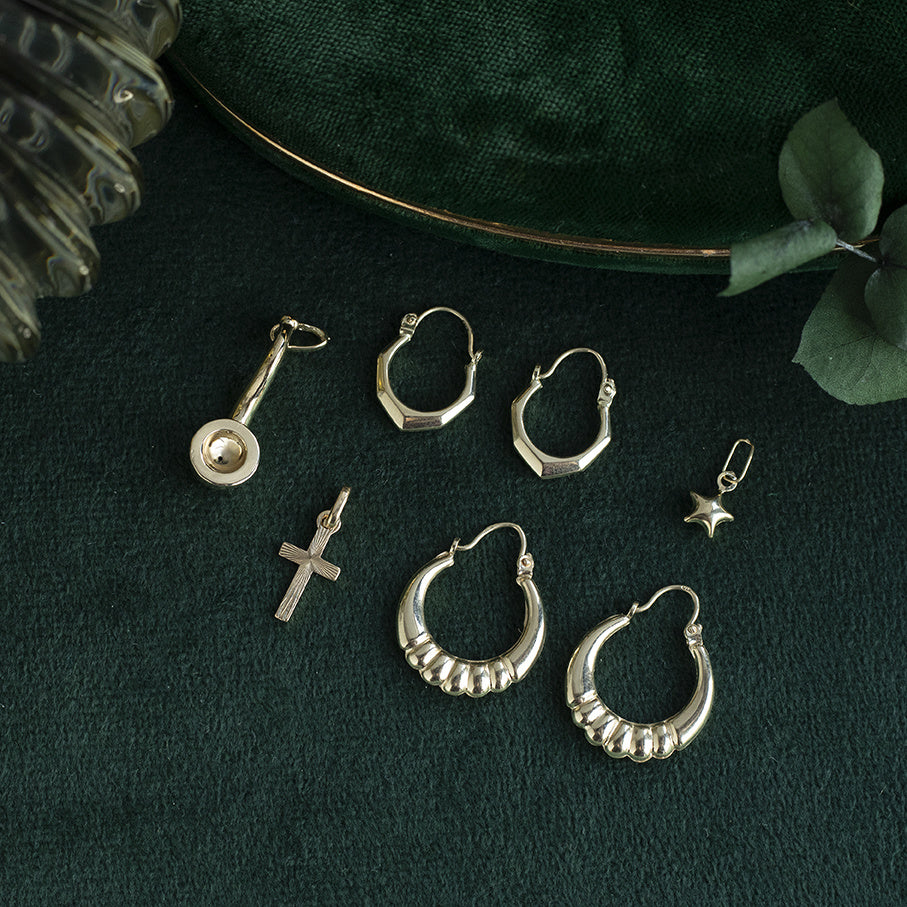 Gouden vintage fantasie oorringen 14 kt