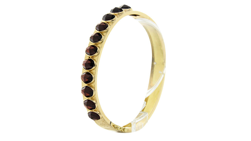Gouden bangle met granaat 14 krt