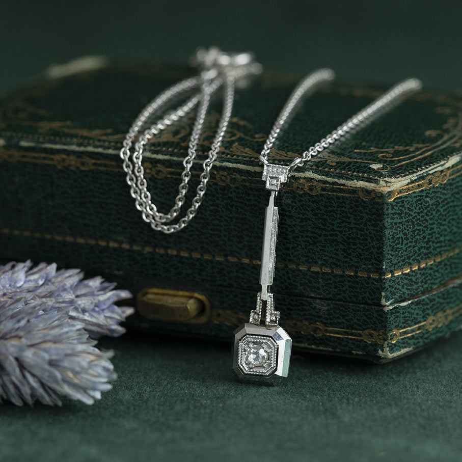 Zilveren vintage collier met witgouden hanger met diamant 14 krt/925