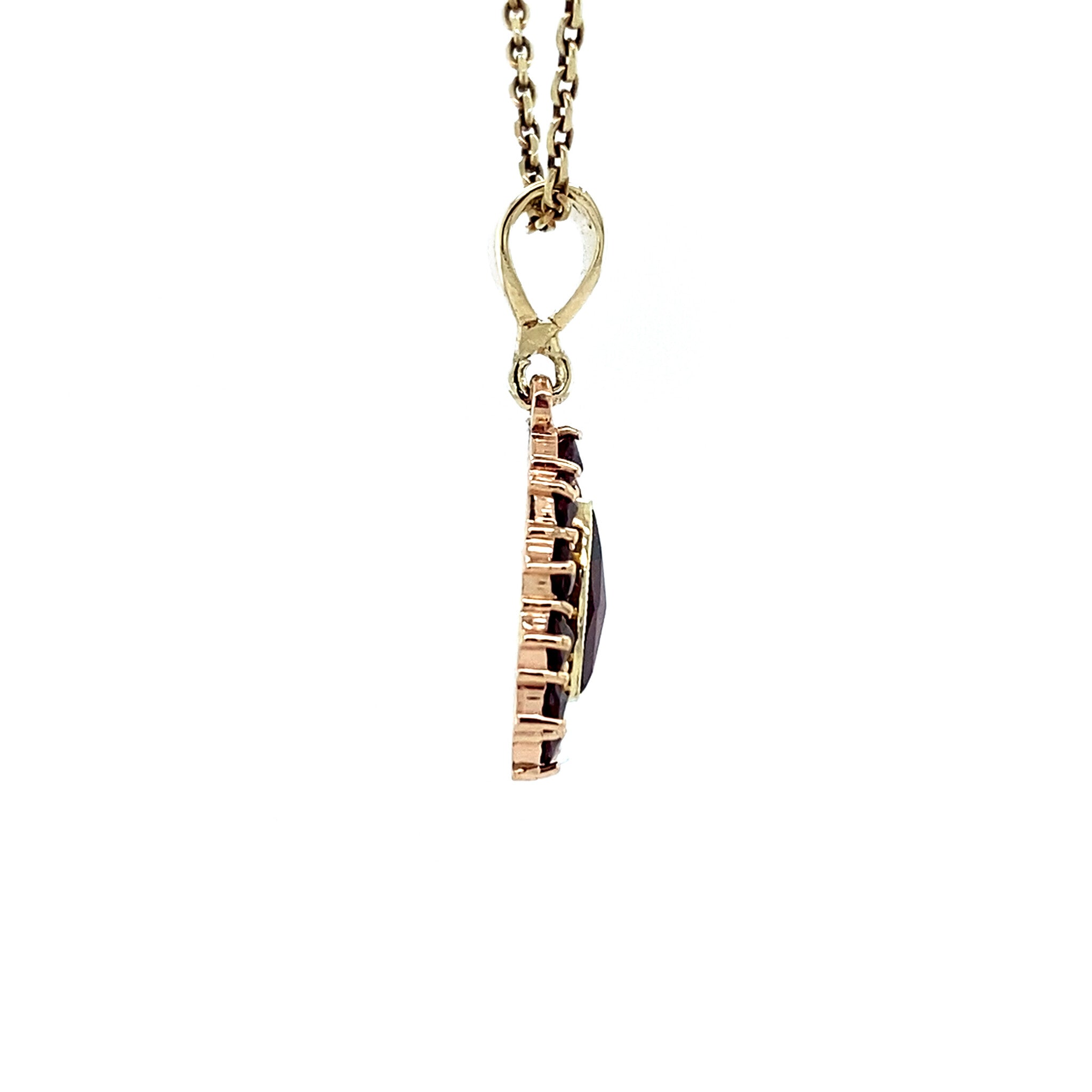 Vintage gold entourage pendant with garnet, 14 kt