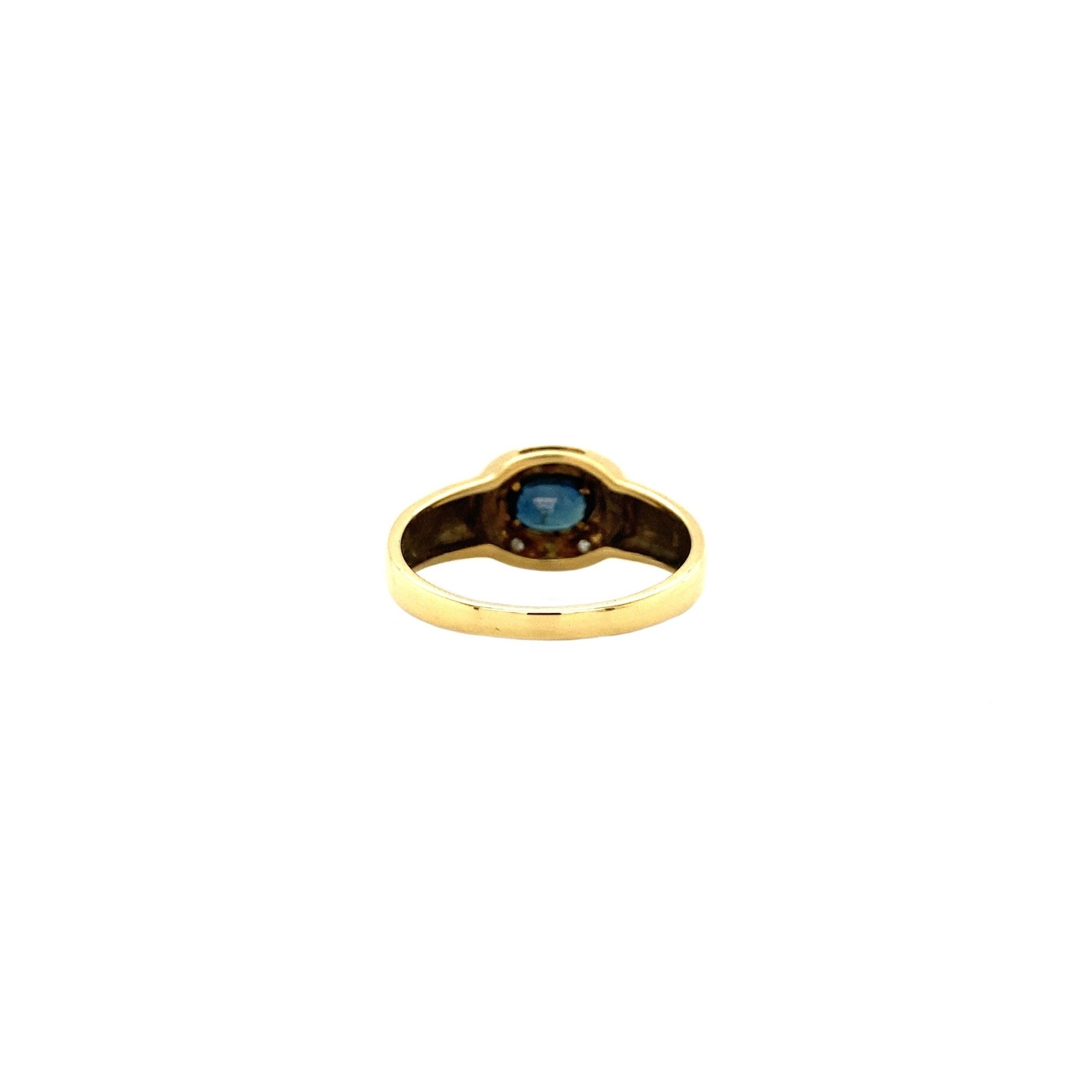 Gouden ring met diamant en saffier 18 krt