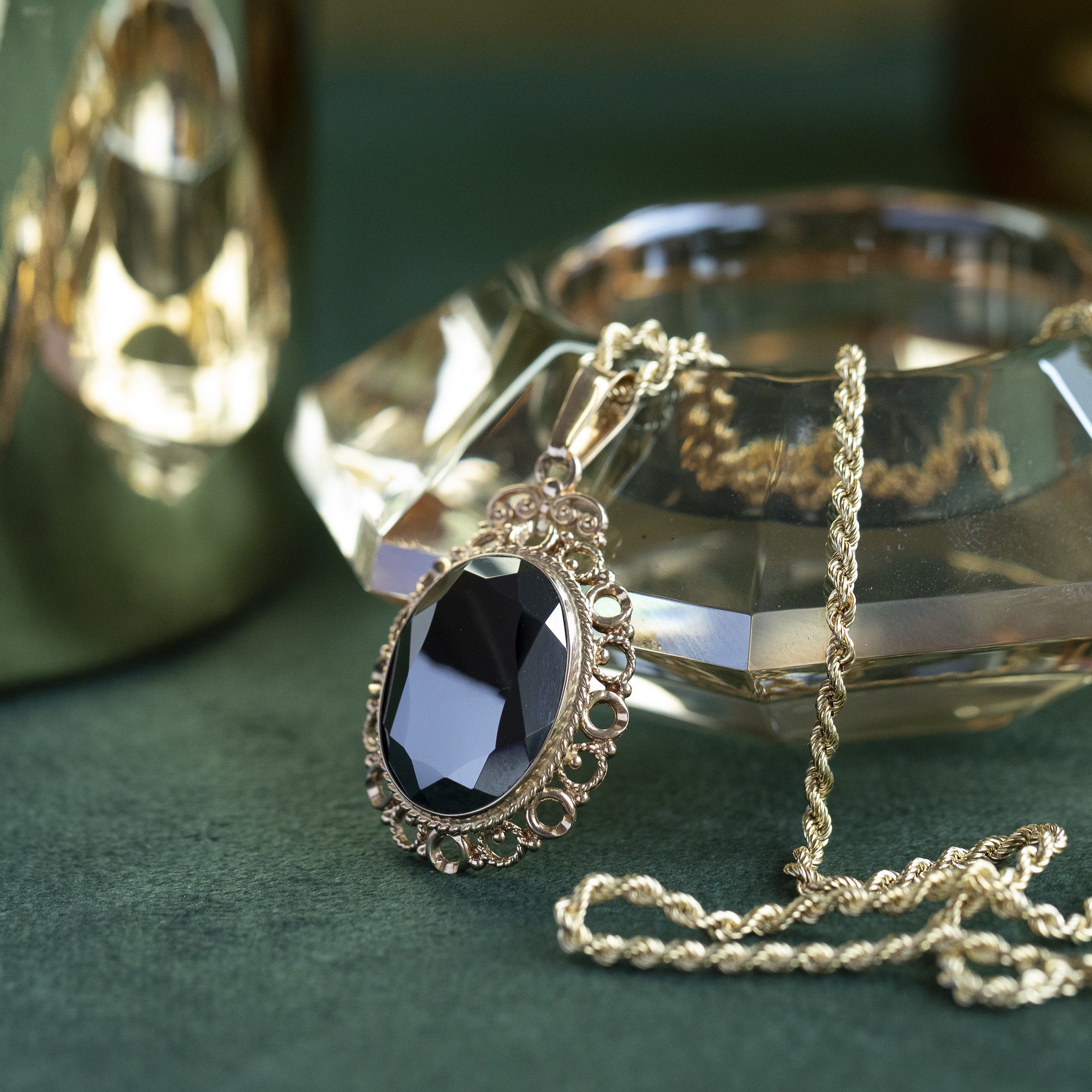 Gouden hanger met hematiet 14 krt