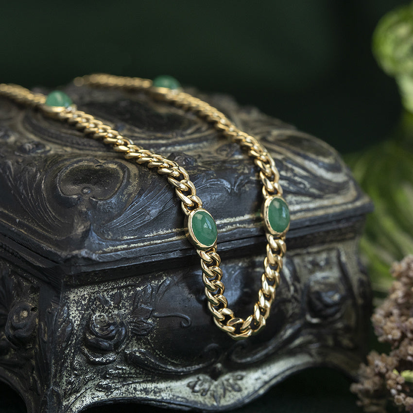 Gouden vintage gourmet armband met smaragd 18 kt