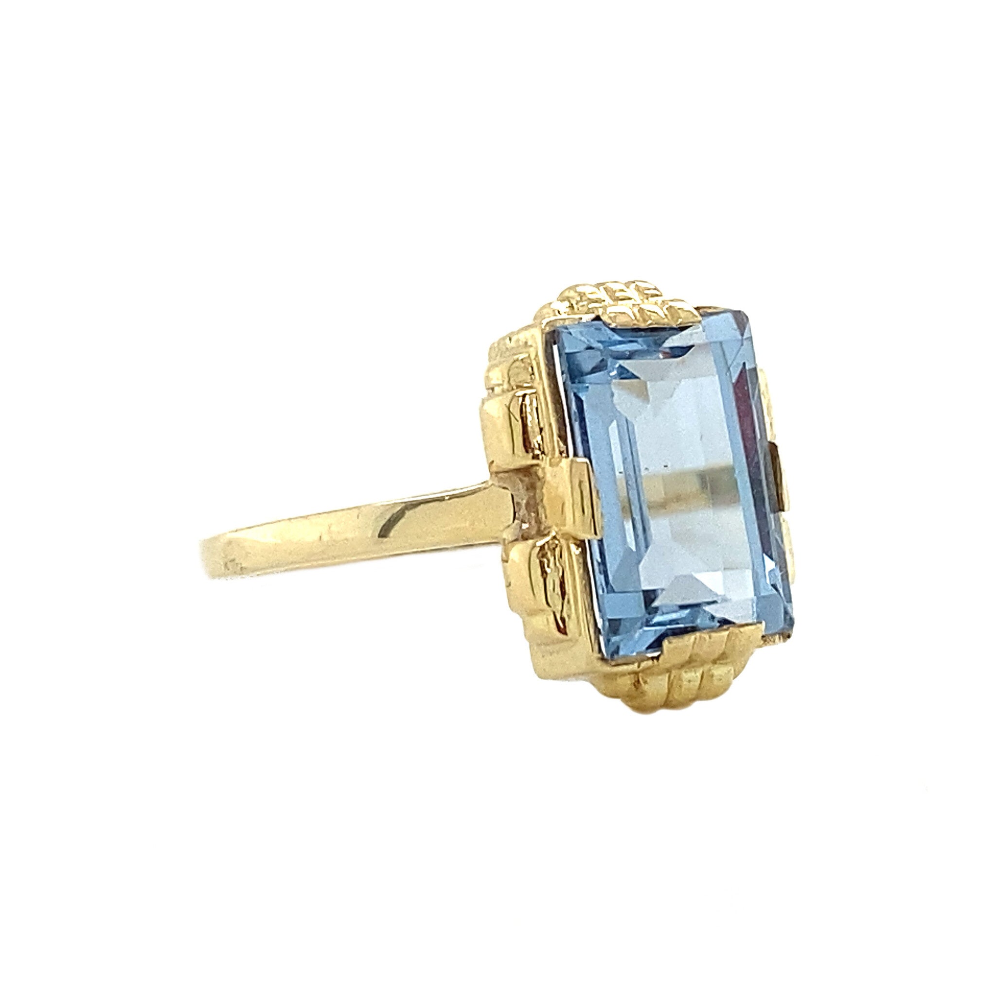 Gouden ring met blauwe spinel 14 krt