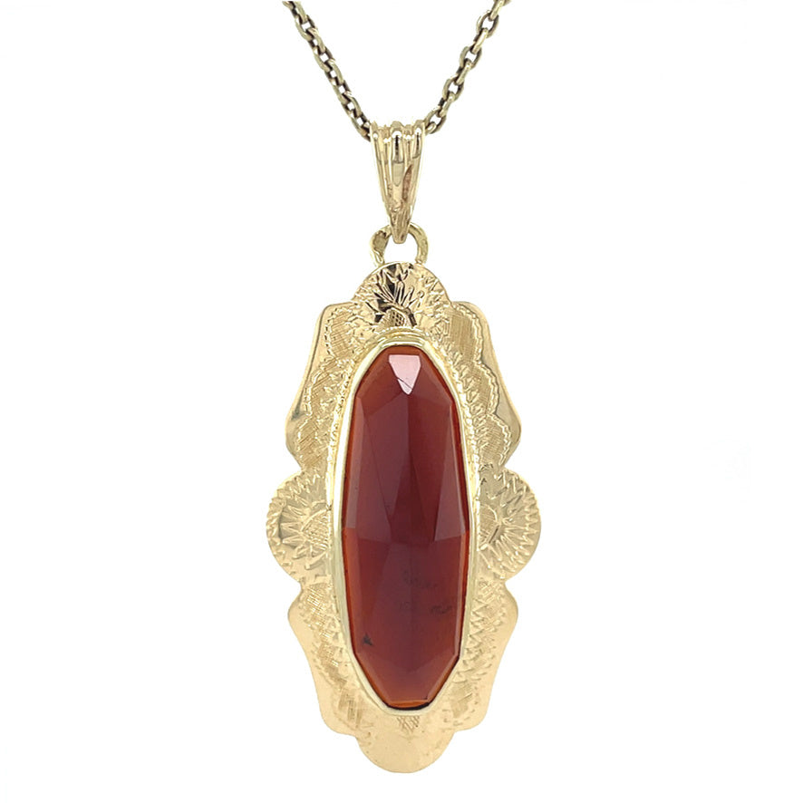 Gold vintage pendant with garnet 14 kt