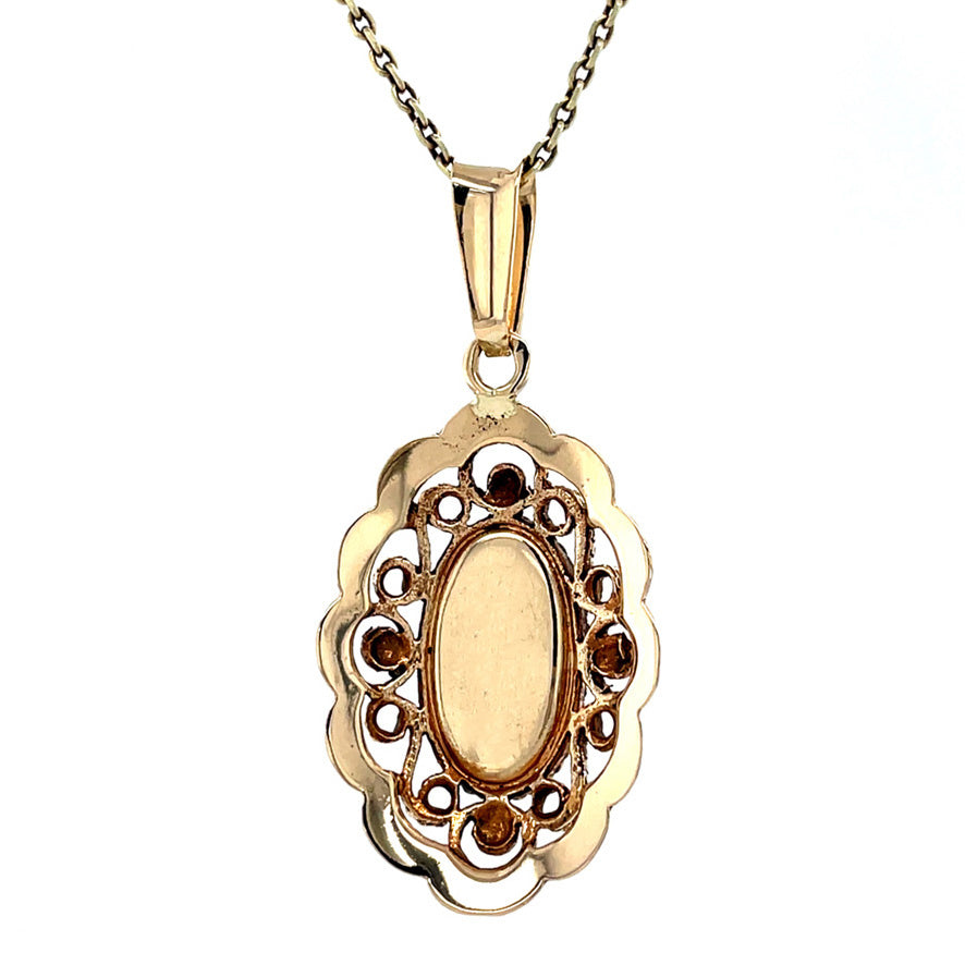 Gouden vintage hanger met bloedkoraal 14 krt
