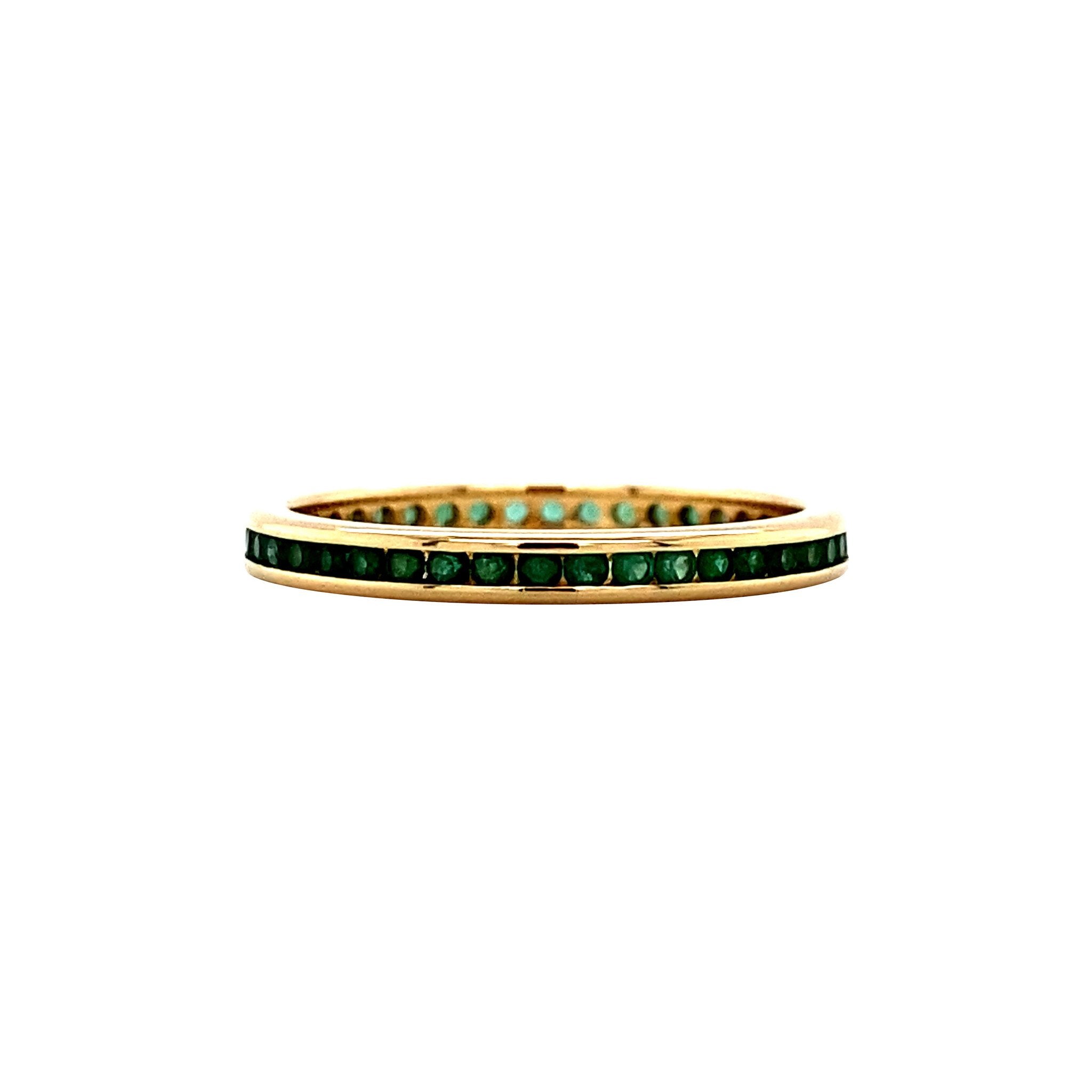 Gold alliance ring with natural emerald 18 krt