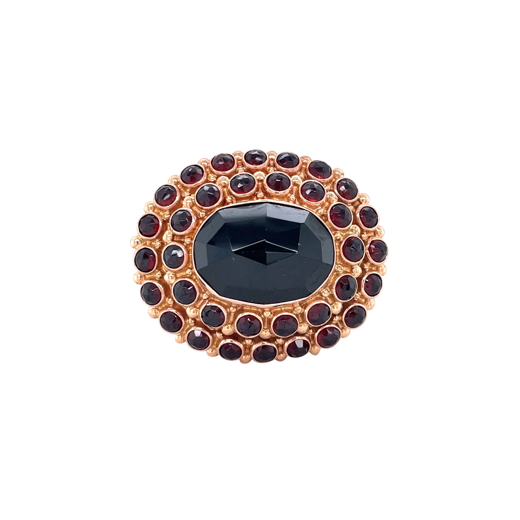 Gouden vintage entourage broche met granaat 14 krt