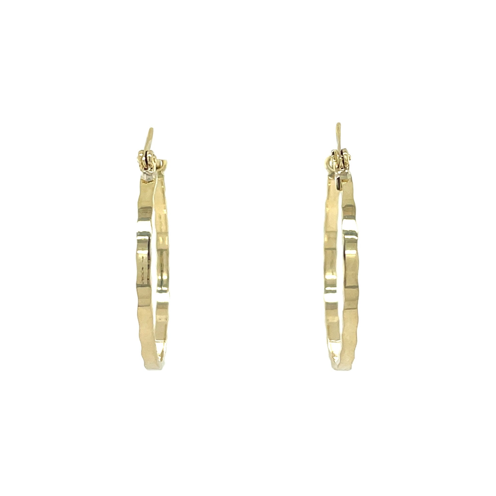 Gouden vintage fantasie oorringen 14 kt