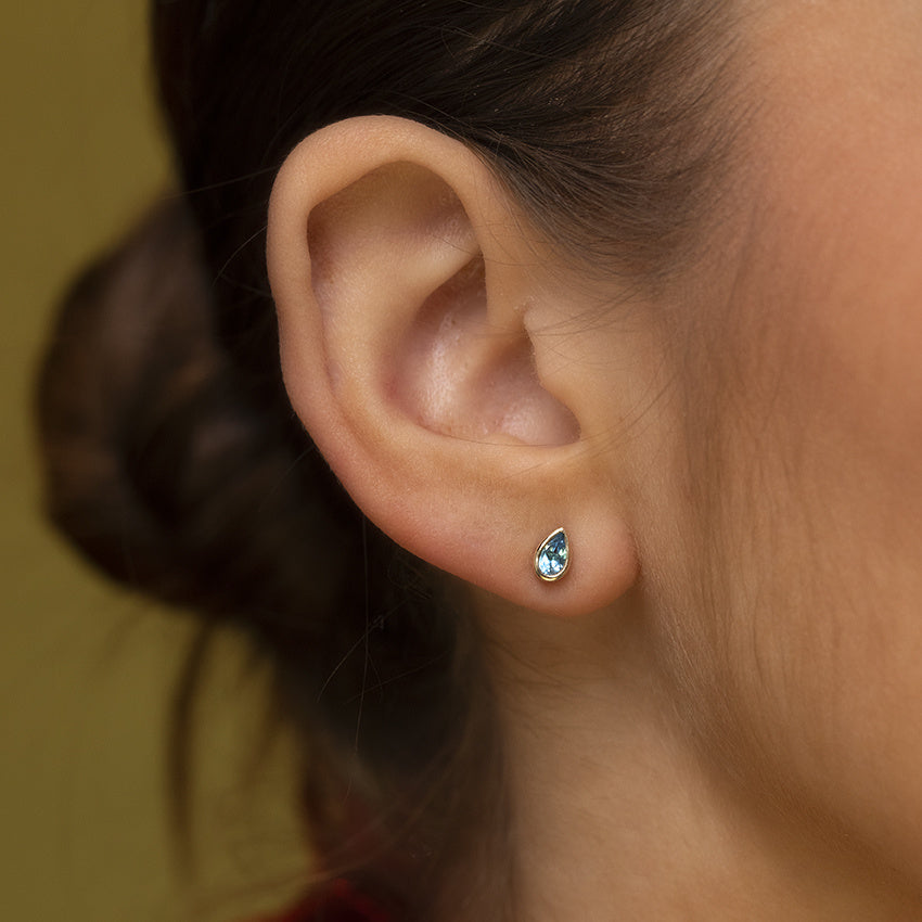 Oorbellen met topaas 9 kt