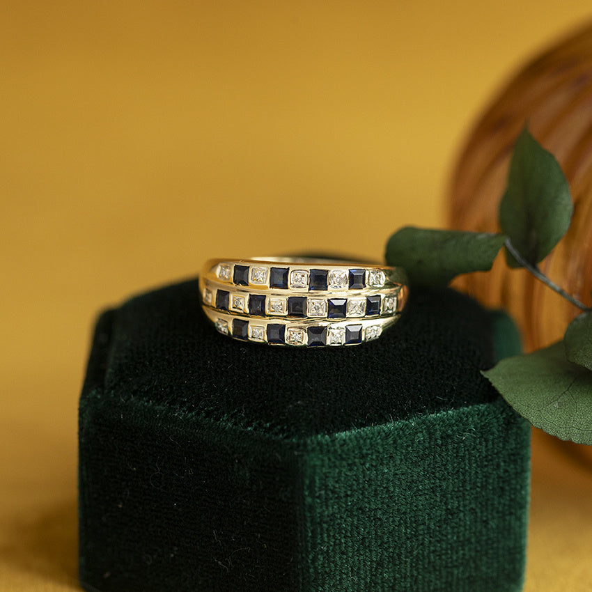 Gouden vintage rij ring met saffier en diamant 14 kt