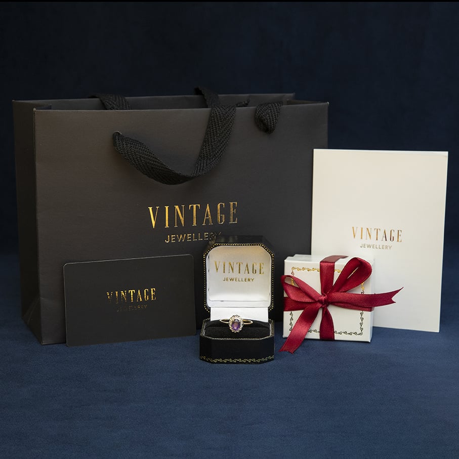 Gouden vintage entourage ring met saffier en diamant 14 kt