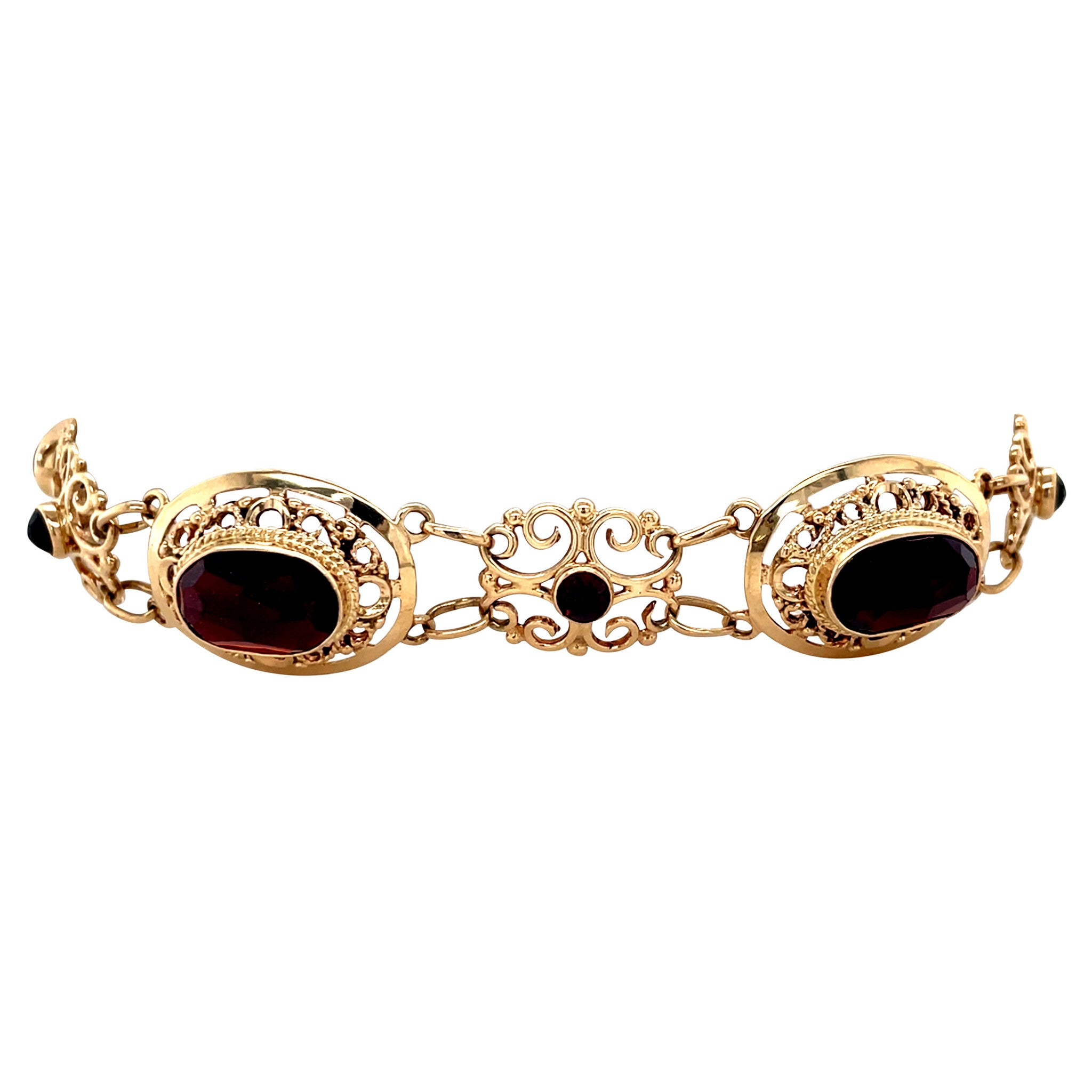 Vintage gold booties bracelet with garnet, 14 kt