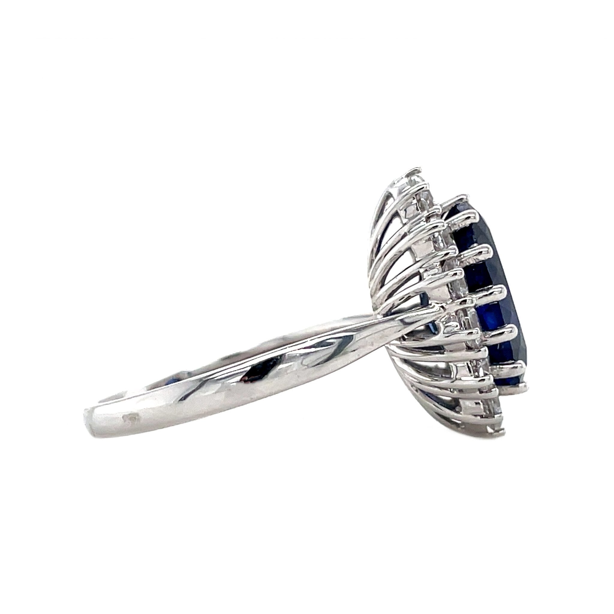 14 kt white gold cluster ring with sapphire and zirconia