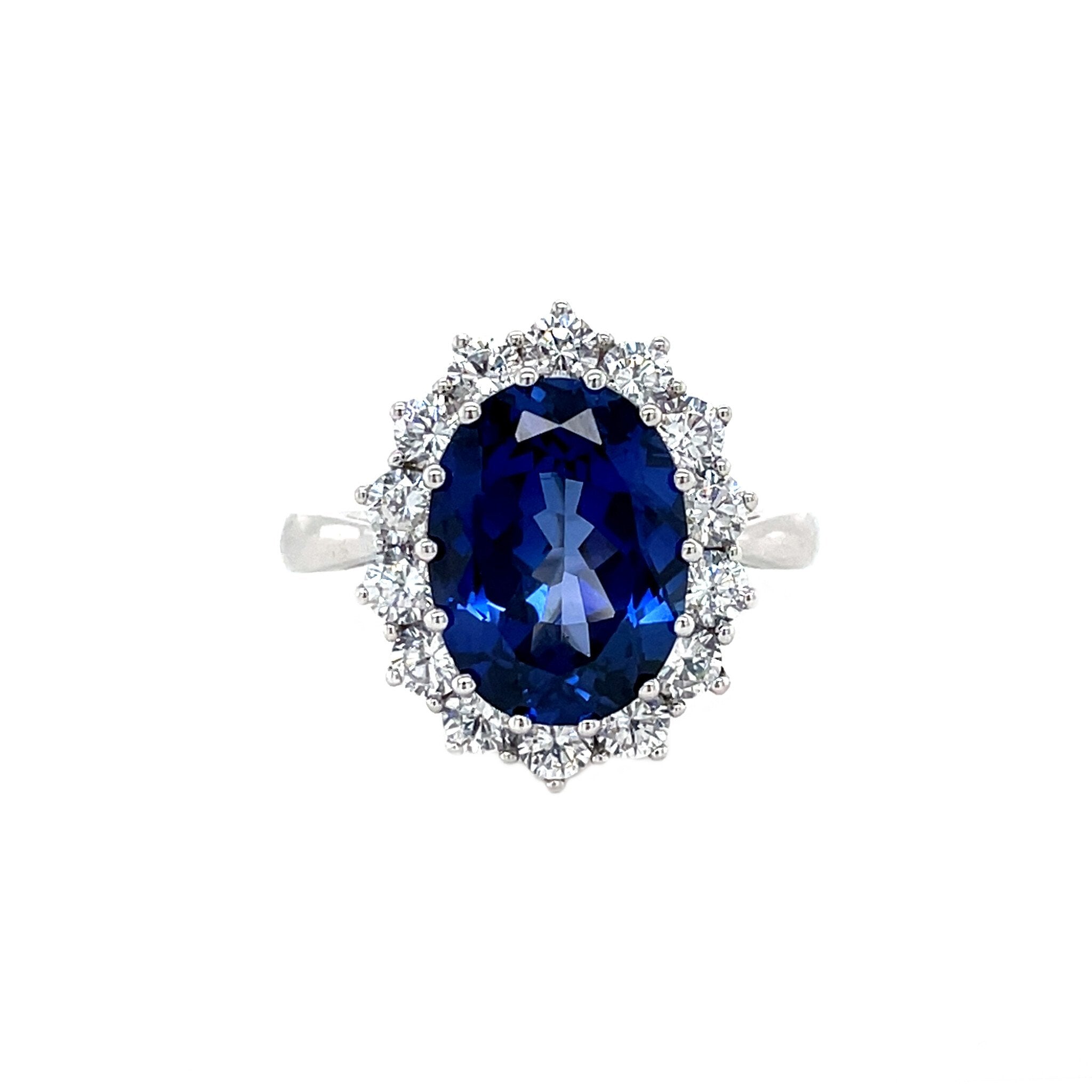 14 kt white gold cluster ring with sapphire and zirconia