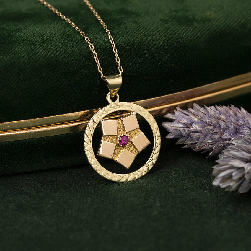 Gouden vintage ster hanger met robijn 14 kt