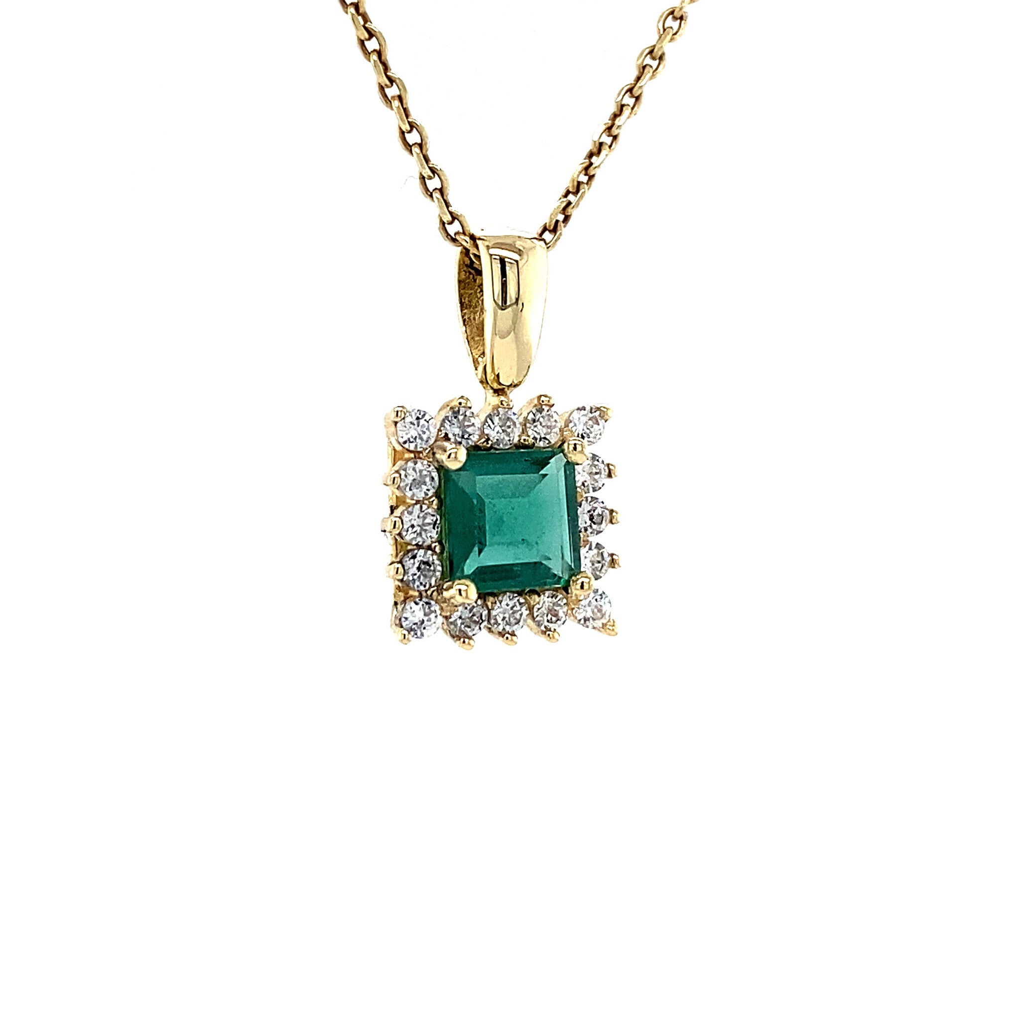 14 kt gold pendant with emerald and zirconia