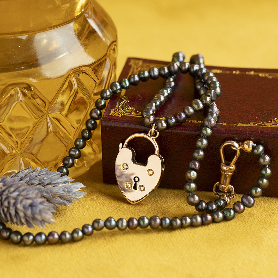 Vintage parel collier met hartjes hanger 9 krt