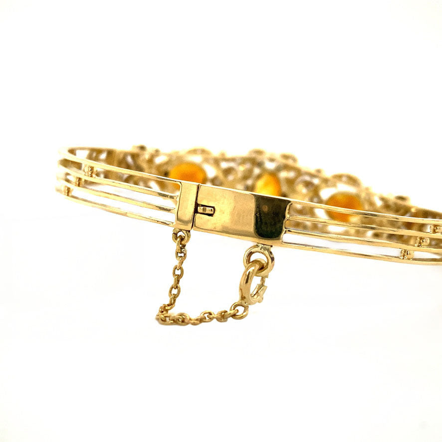 Gouden armband met citrien en diamant 14 krt