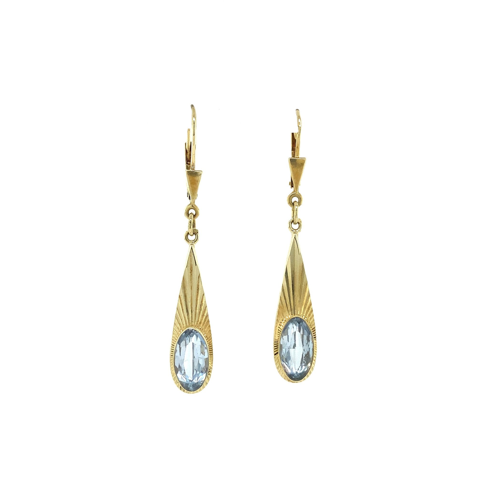14 kt gold earrings with blue spinel