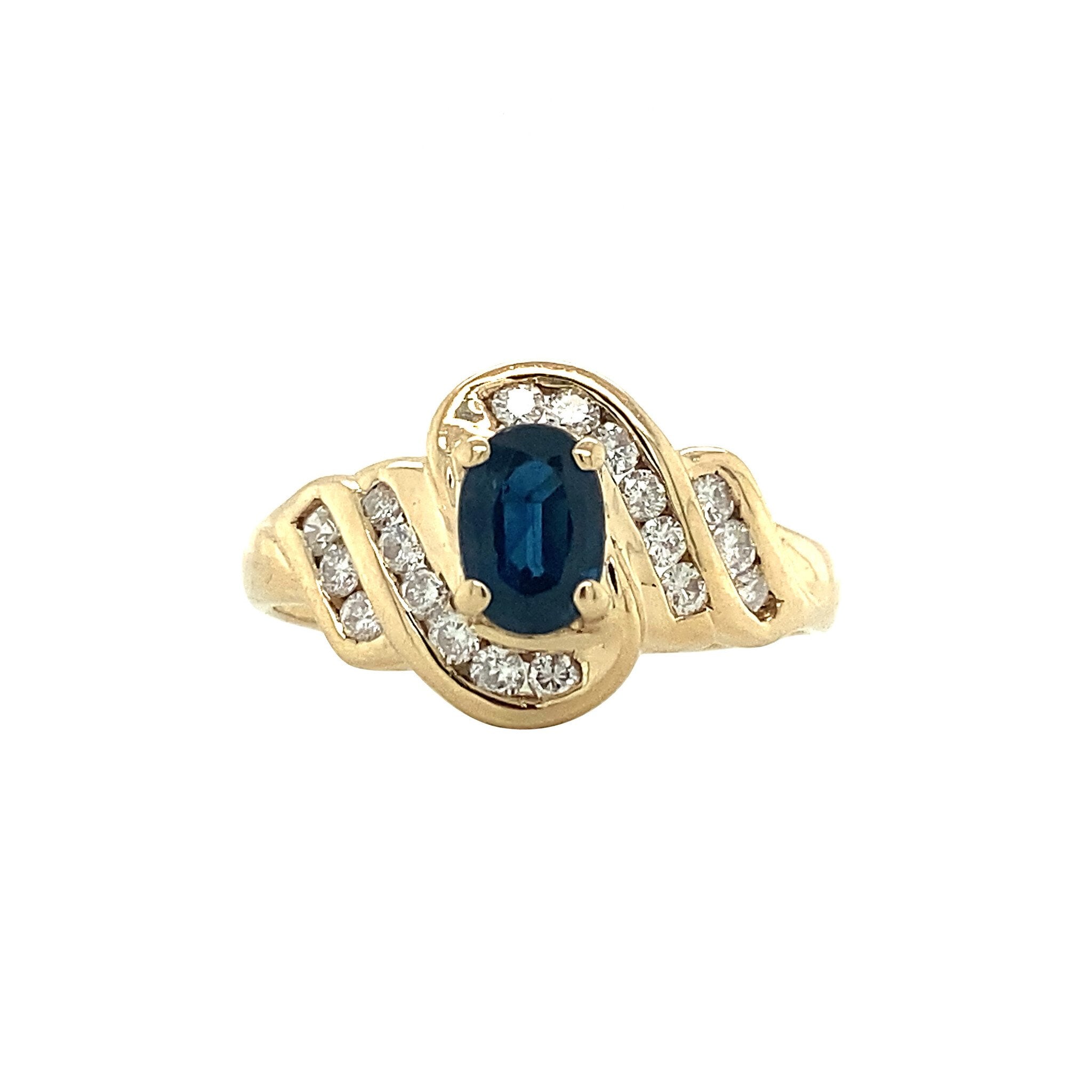 14-kt gold ring with sapphire and diamond