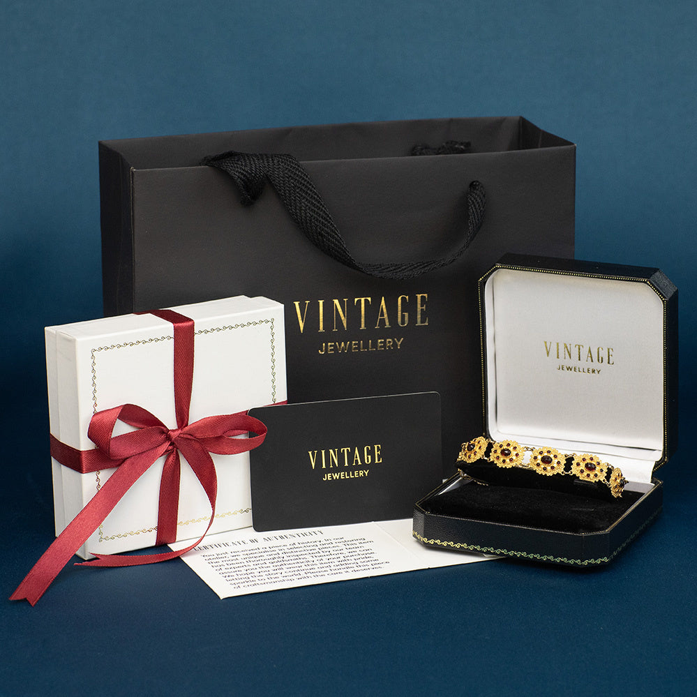 Gouden vintage bangle met saffier 14 krt