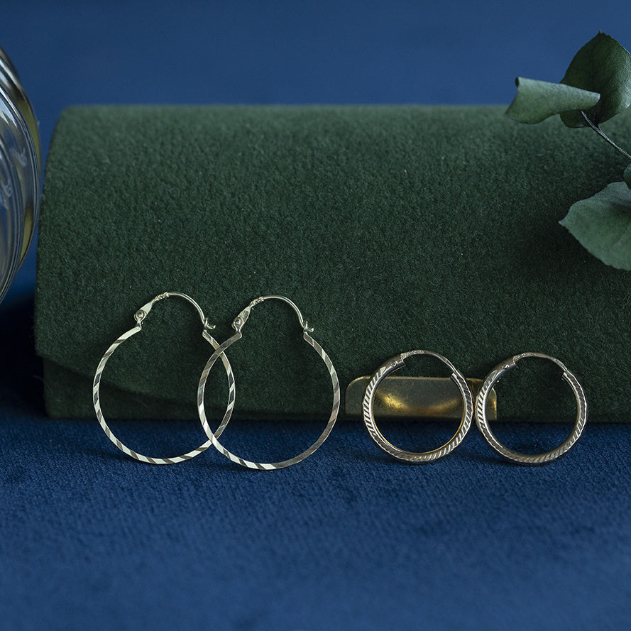 Gouden vintage fantasie oorringen 14 kt