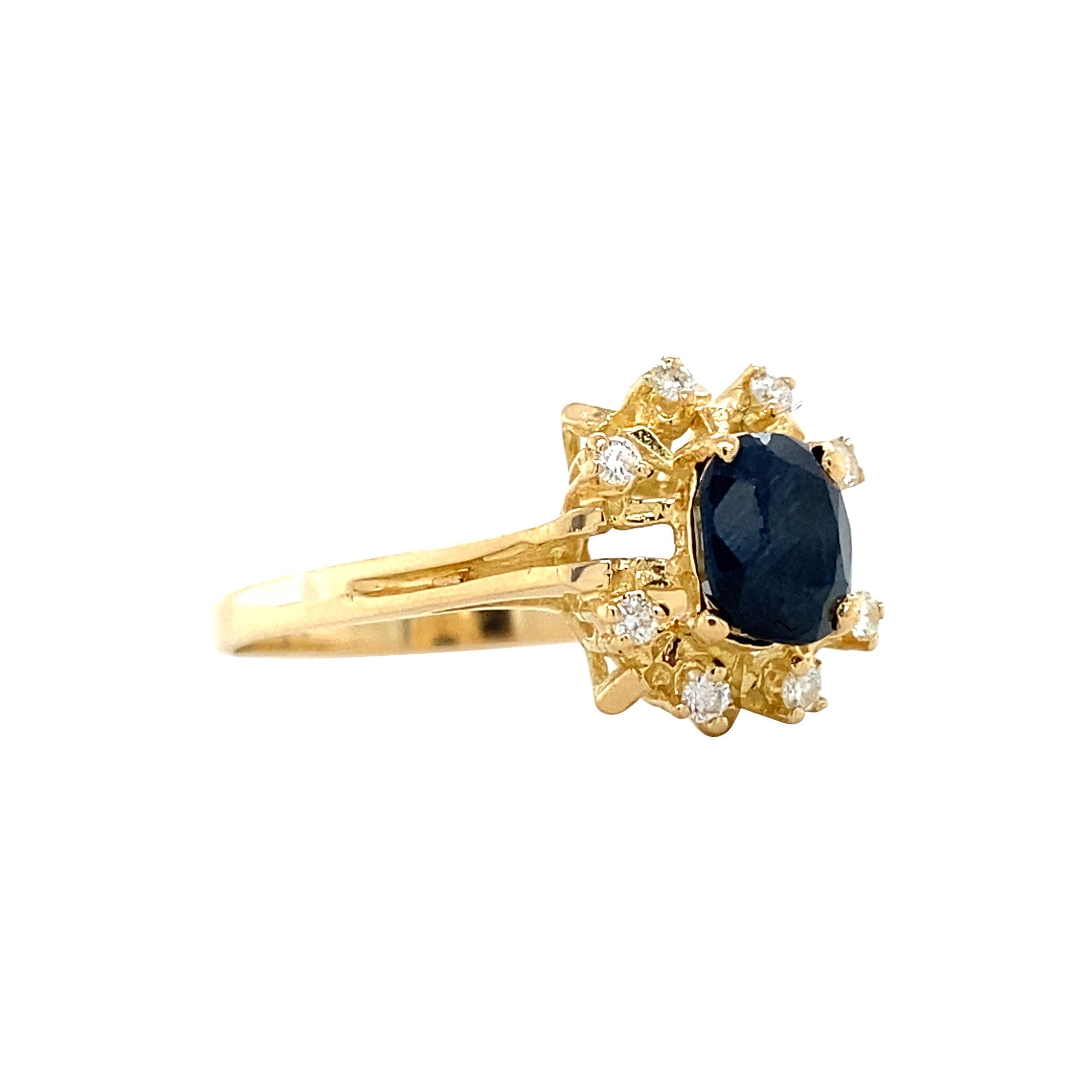 Gouden vintage entourage ring met saffier en diamant 18 krt