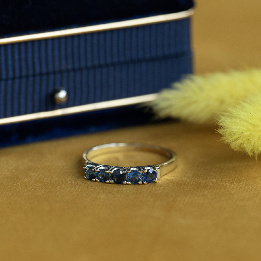 Vintage white gold row ring with sapphire, 14 kt