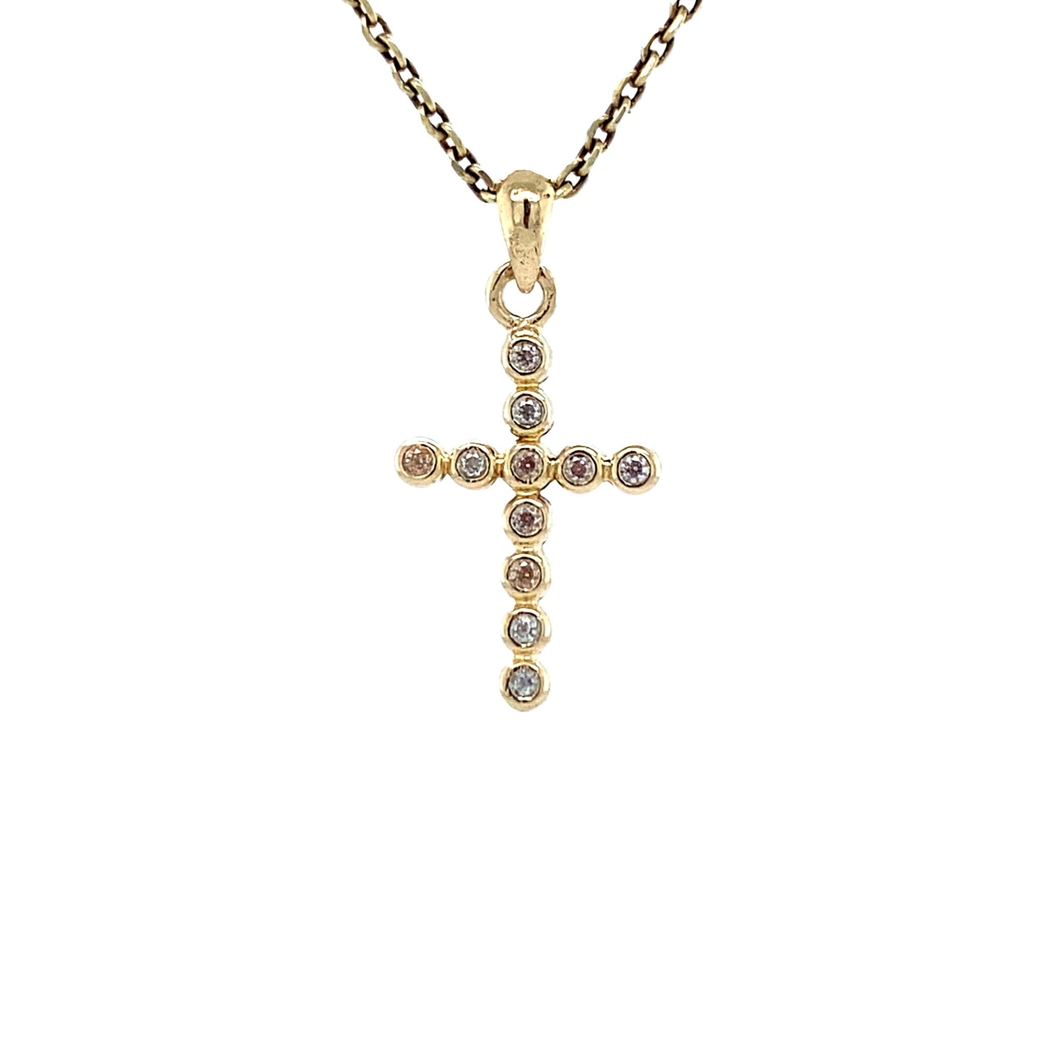 14 kt gold cross pendant with diamond