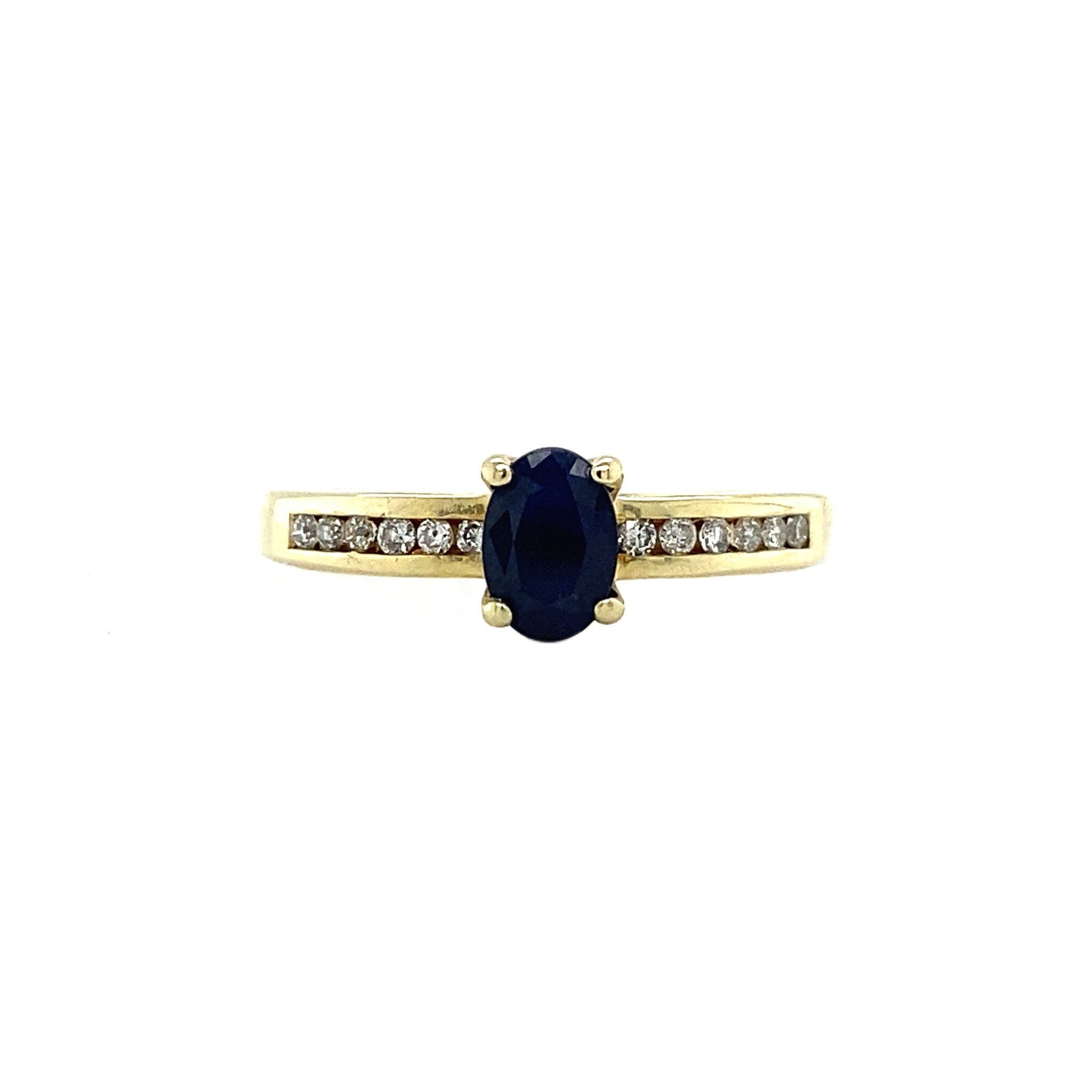 Gouden ring met saffier en diamant 14 krt