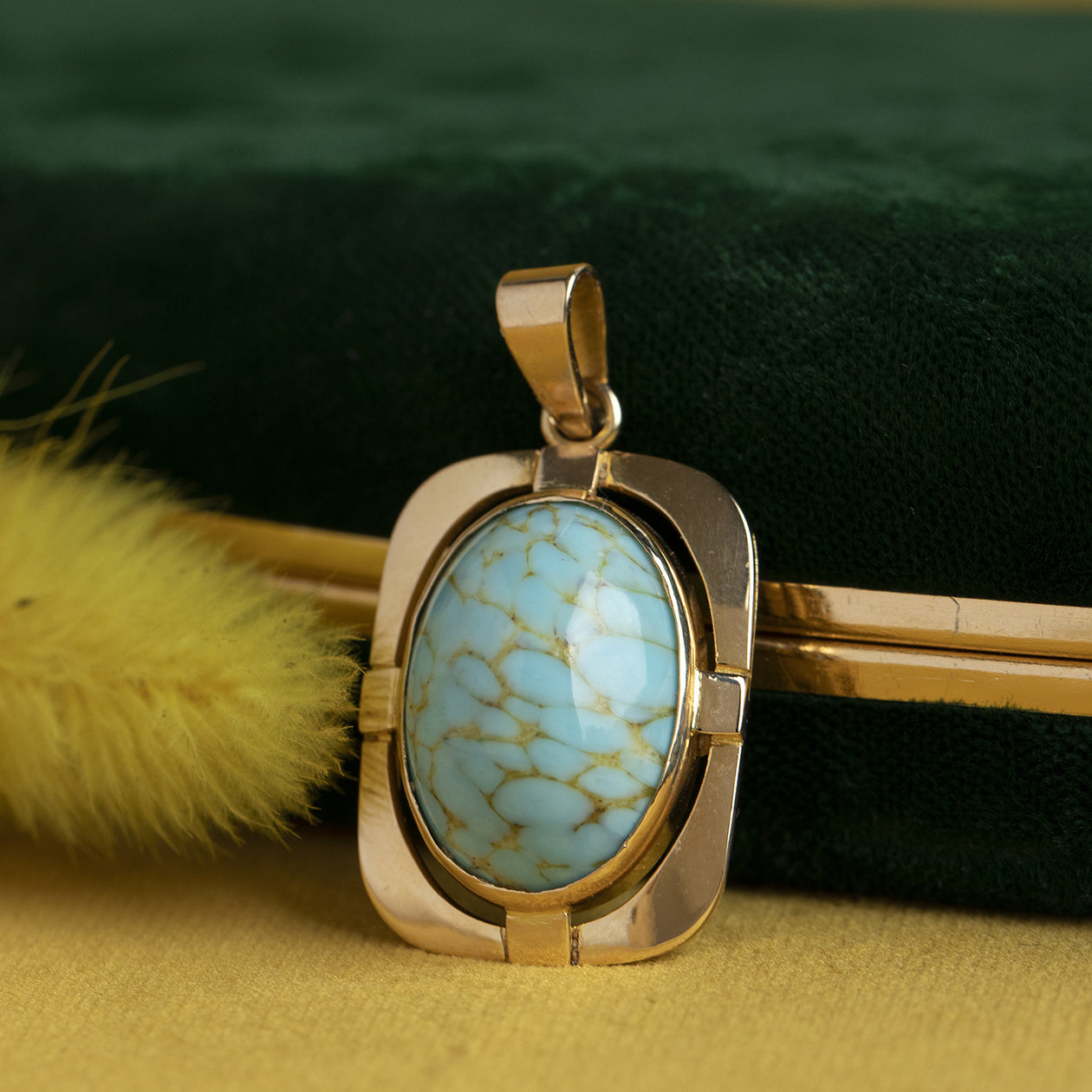 Gouden hanger met turkoois 14 krt