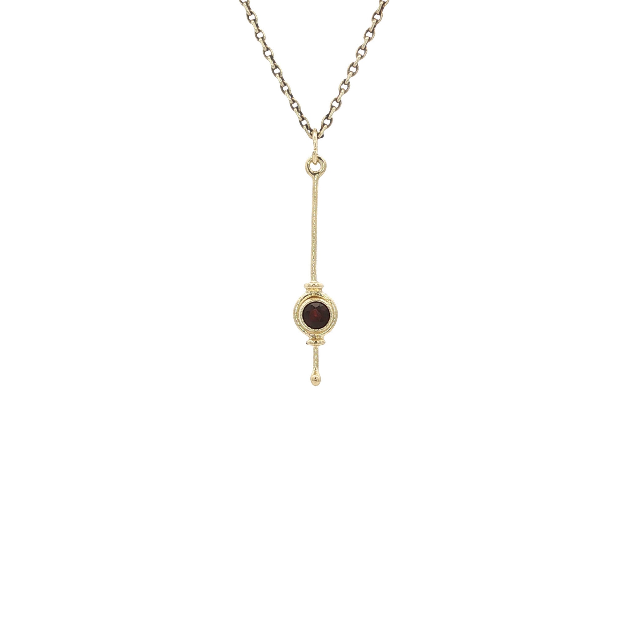 Gold vintage pendant with garnet 14 kt