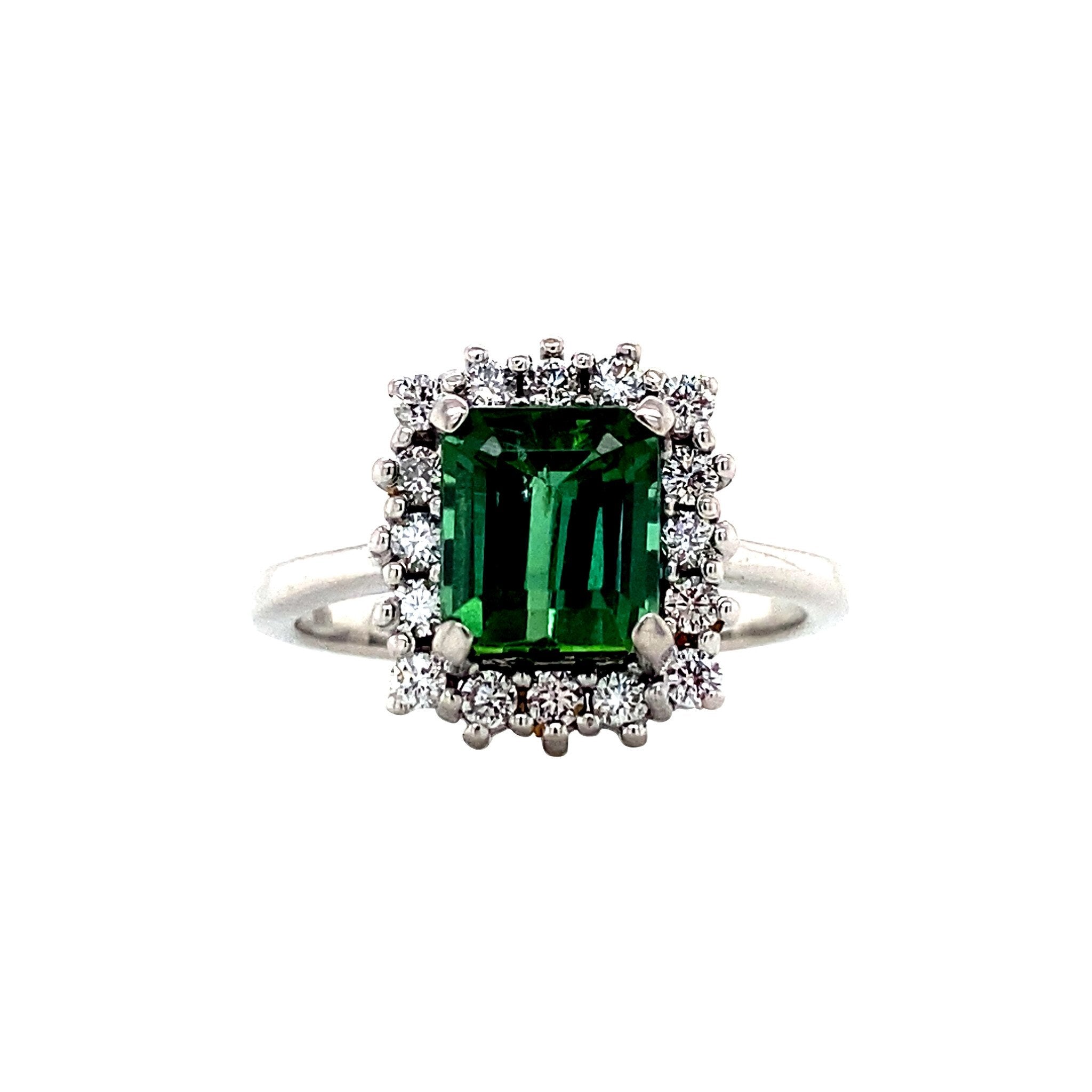 14 kt white gold halo ring with tourmaline and diamond