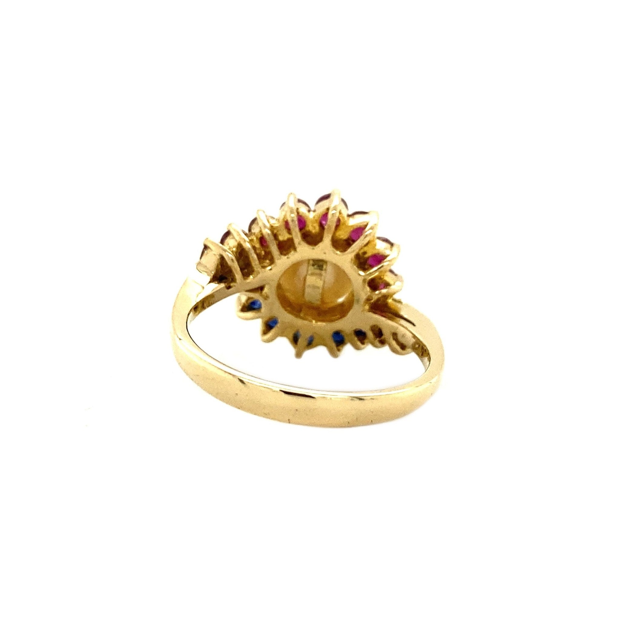 Gouden ring met saffier, robijn en parel 14 krt