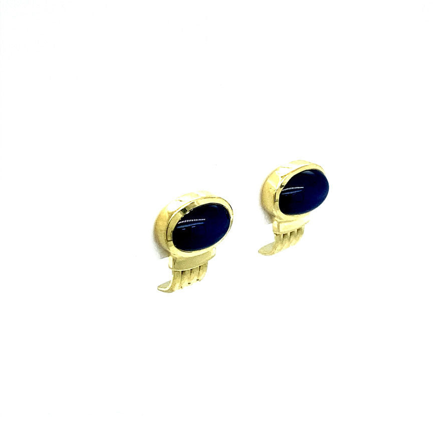 14 kt gold stud earrings with star sapphire