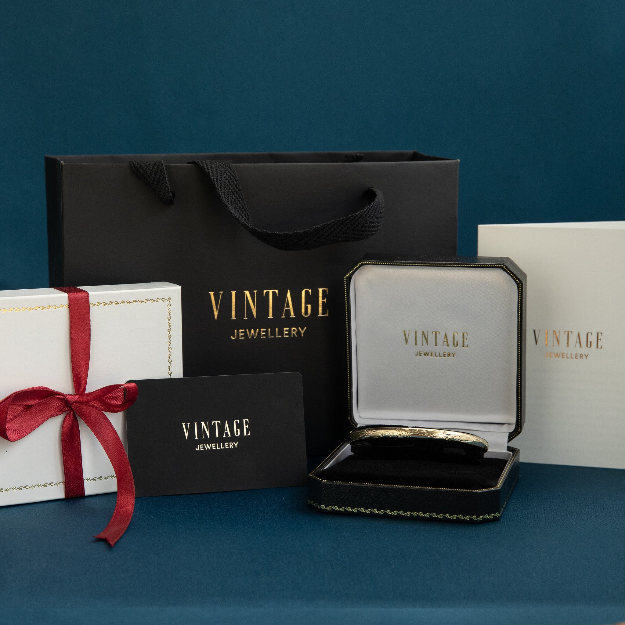 Gouden vintage bangle met granaat 14 krt